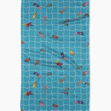 Blue towel with colorful swimmers pattern on a white background